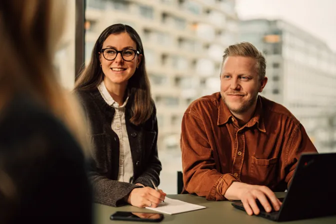 Smiling female workning at Axfood