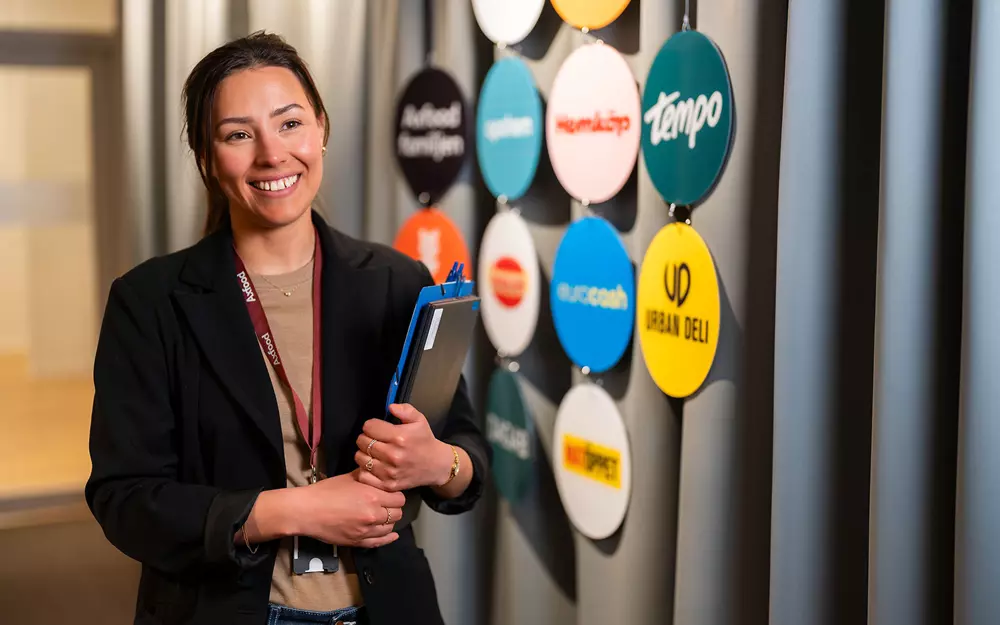 Female employee walking in corridor