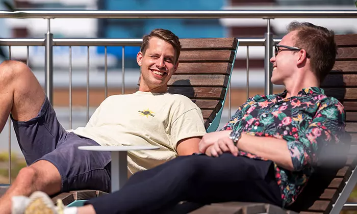 Male employees at Axfood talking