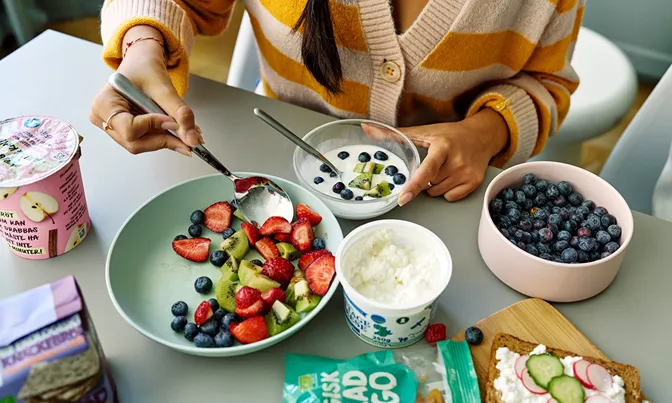 Girl eating healthy food from Garant