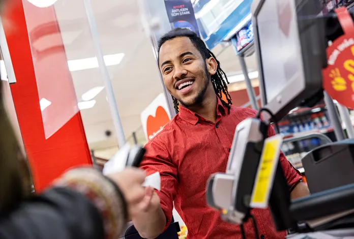 Employees in store smiling